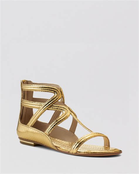 michael kors ladies gold sandals.